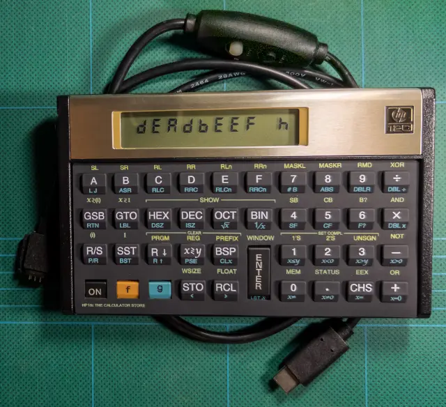 2025 new-production HP-12C running HP-15C CE firmware 0A0A, in HP-16C mode